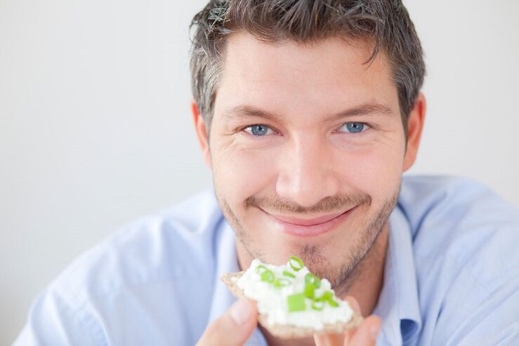 a man eats healthy food for potency